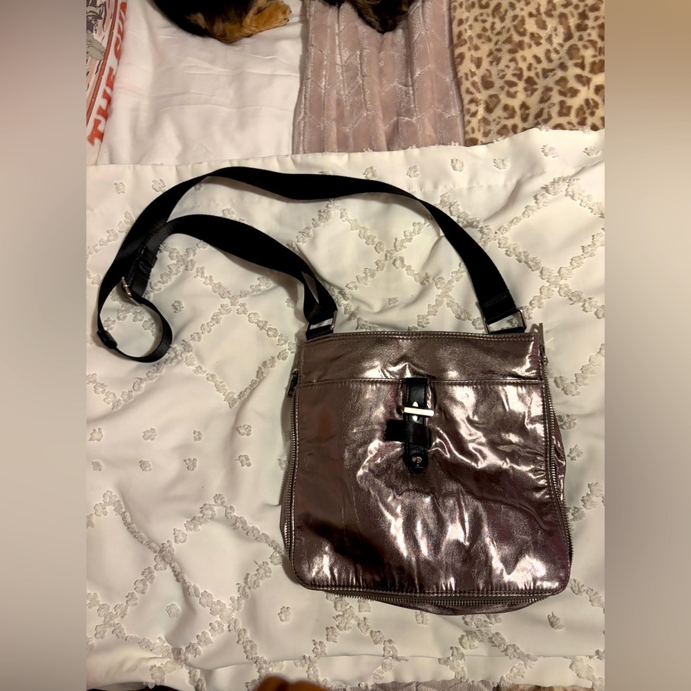 I.N.C chrome silver crossbody purse.